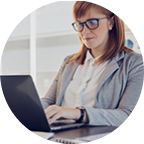 woman typing on laptop